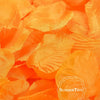 A close-up of vibrant orange silk rose petals used for weddings and events.
