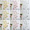 Set von drei 3D-Hohl-Schmetterlings-Wandaufklebern in Gold, Roségold und Silber.