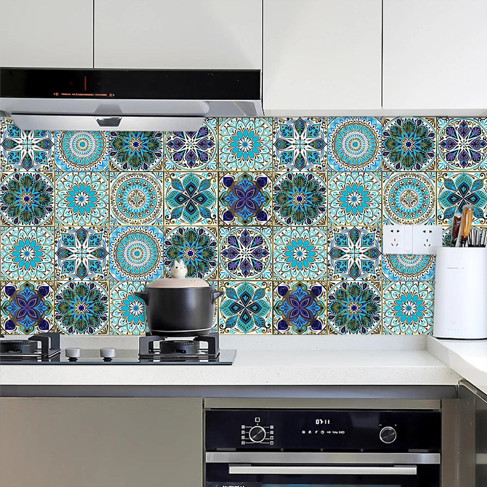 A kitchen backsplash featuring colorful mandala tile stickers with blue, teal, and purple patterns.