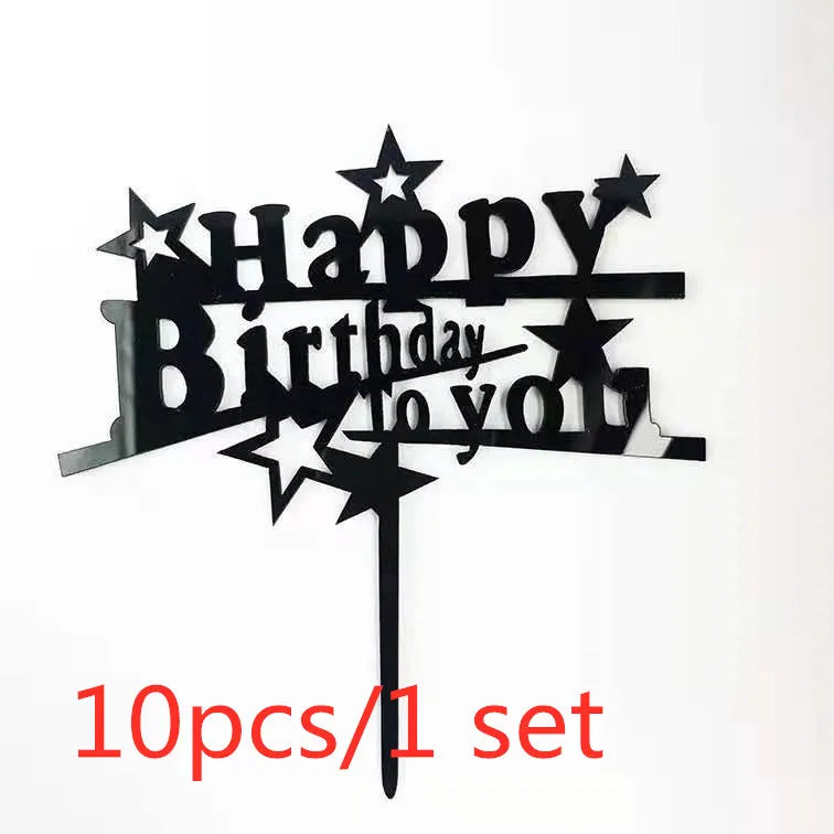 Black acrylic happy birthday cake toppers with stars and text on a stick