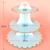 A three-tier cardboard cupcake stand with a light blue color and gold accents, showing its dimensions.