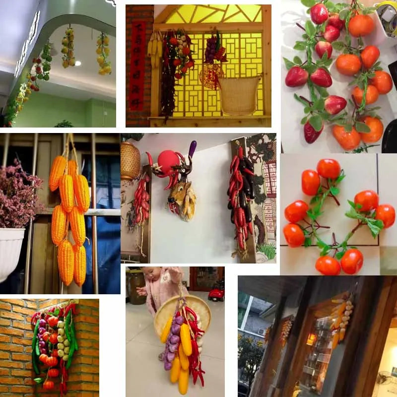 A collection of lifelike artificial fruits and vegetables including tomatoes, peppers, and gourds for decoration.
