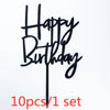 Black acrylic birthday message topper spelling out Happy Birthday