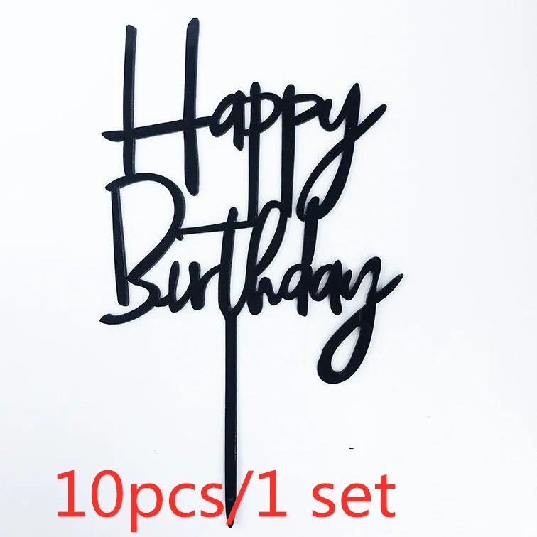Black acrylic birthday message topper spelling out Happy Birthday