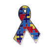 A puzzle ribbon brooch pin featuring the colors of the autism awareness rainbow