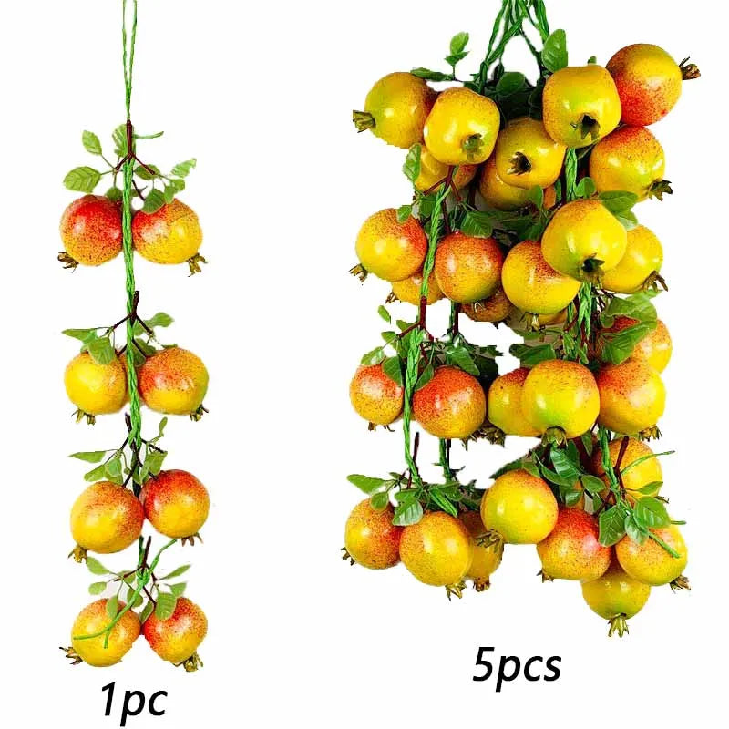 A cluster of artificial yellow and green fruits and vegetables used for decoration or photography.