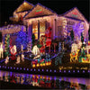 A house decorated with numerous outdoor LED string lights for holiday display.