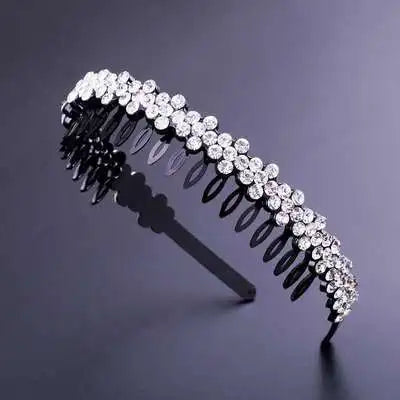A sparkling crystal rhinestone headband for women displayed against a dark gray background.