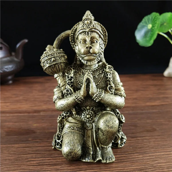 Bronze Hanuman statue figurine of a monkey god sitting in a meditative pose