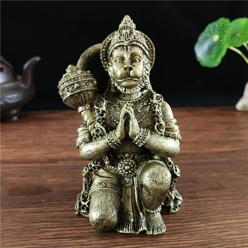 Bronze Hanuman statue figurine of a monkey god sitting in a meditative pose
