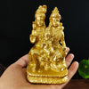 Hand-finished resin figurine of a Hindu or Buddhist deity with a child seated on its lap