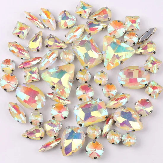 A collection of assorted silver claw setting glass rhinestones in jelly candy AB colors.