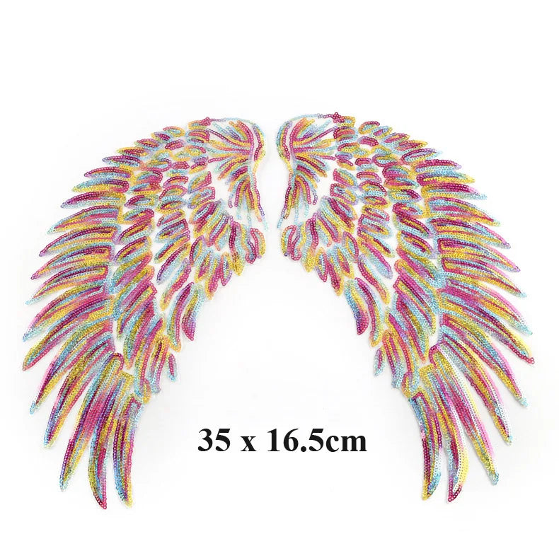 A pair of large sequin wing patches for DIY sew-on or iron-on embellishment, featuring iridescent pink and yellow sequins.