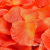 Vibrant orange silk rose petals arranged in a dense cluster for weddings and events.