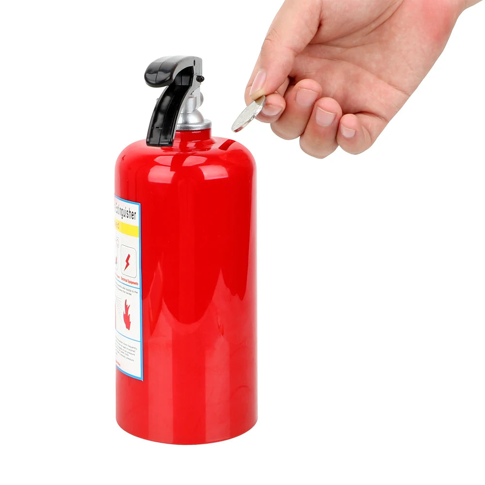 A hand is opening a red fire extinguisher money box to retrieve coins or bills.