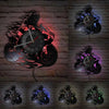 A set of five motorcycle rider vinyl record wall clocks displayed against a brick background.