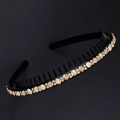 Black crystal rhinestone headband for women shown against a dark background