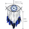Handmade boho evil eye dream catcher wall decor featuring a blue and black netted eye with dangling feathers