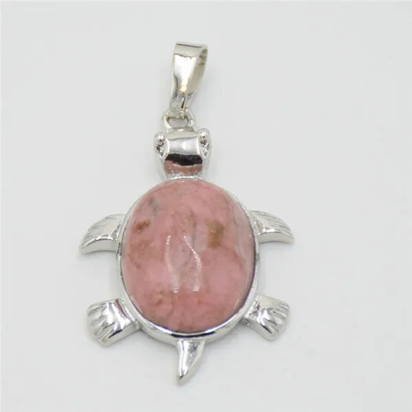 Silver pendant necklace featuring a polished pink rose quartz oval stone shaped like an animal.