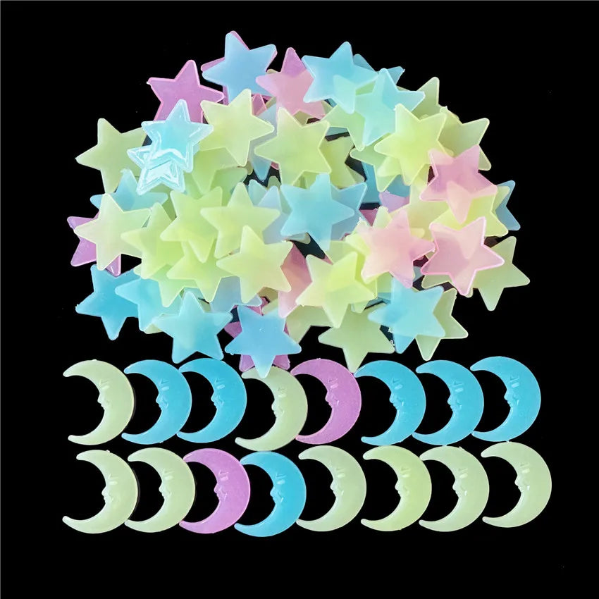 A collection of glow-in-the-dark star and crescent moon wall stickers in pastel colors.