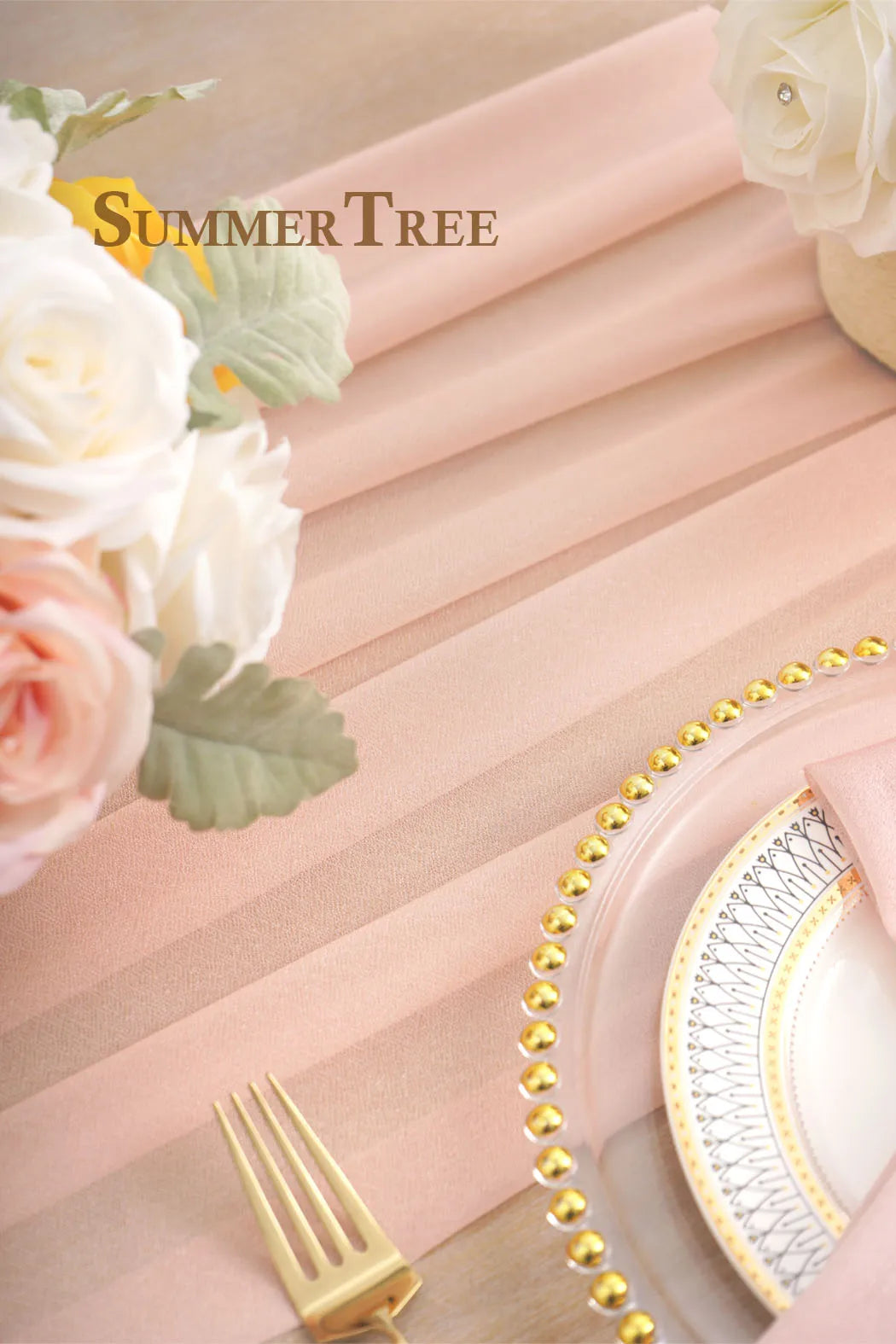 Pink chiffon fabric draped with white roses and green leaves for a wedding arch backdrop