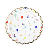 A white paper plate with a gold rim decorated with colorful balloons and party icons for children's events.