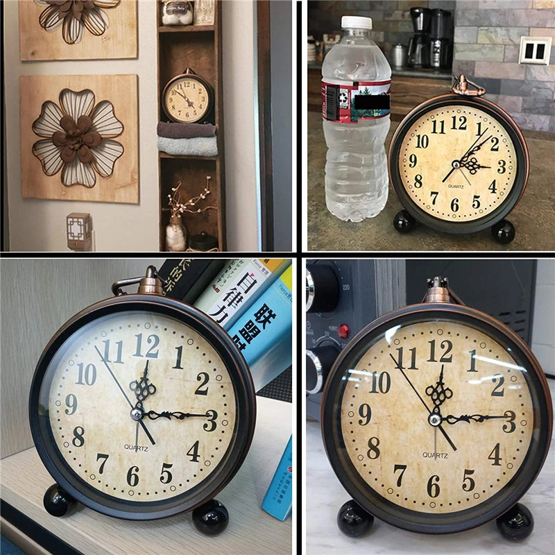A collection of vintage metal battery alarm clocks and a modern clock with a glass face on a shelf.
