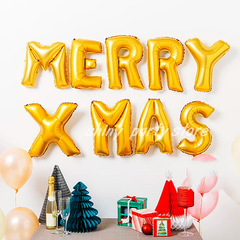 Gold foil letter balloons spelling 'MERRY XMAS' displayed against a white background with festive decorations.