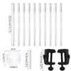 A set of clear plastic balloon arch column stands and black clip holders for display.