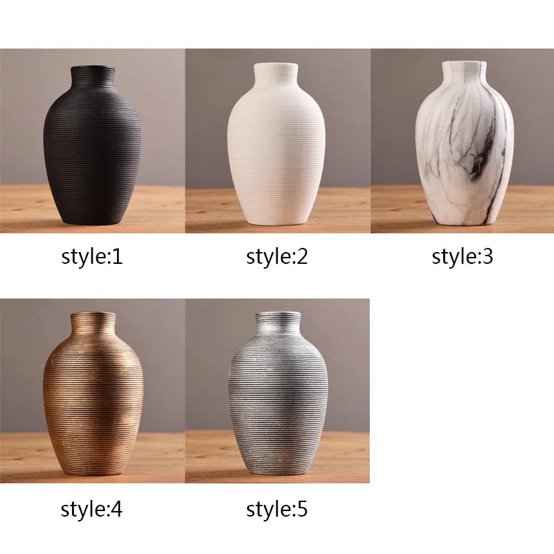 Five variations of a modern ceramic flower vase in black, white, gold, and silver finishes.
