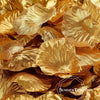 A close-up of golden silk rose petals used for weddings and events.