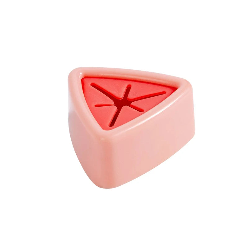 A pink suction cup towel holder with a red, star-shaped hook on the front.