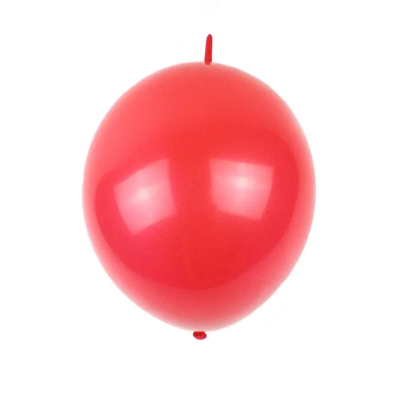 A bright red latex balloon with a thin stem against a white background.