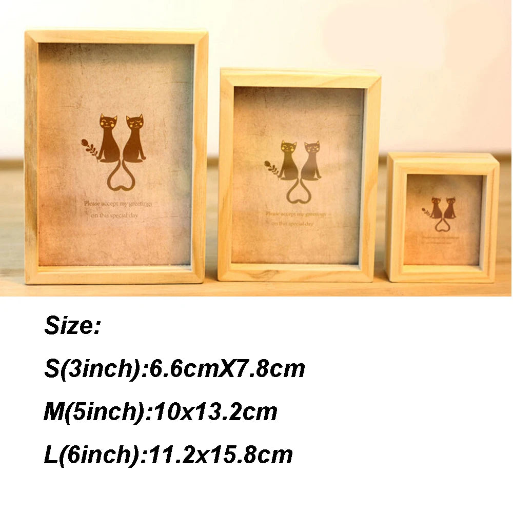 A set of three vintage wooden photo frames featuring silhouette designs of cats on a light wood background.