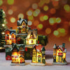 A collection of festive Christmas house night lights featuring warm LED glow and detailed architectural facades.