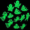 A set of glow-in-the-dark stickers depicting angels and cherubs against a black background.