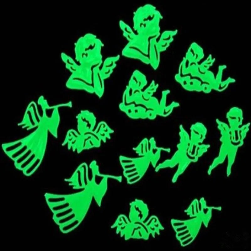 A set of glow-in-the-dark stickers depicting angels and cherubs against a black background.