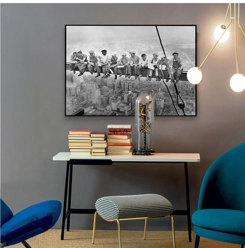 Black and white canvas wall art depicting a cityscape skyline with people on a train.