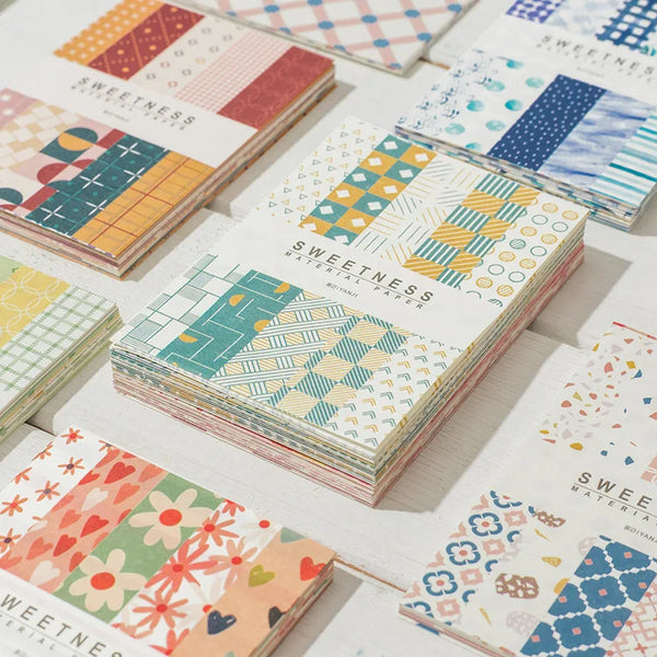 A collection of decorative memo pads and cards in various patterns and colors for a journal paper pack