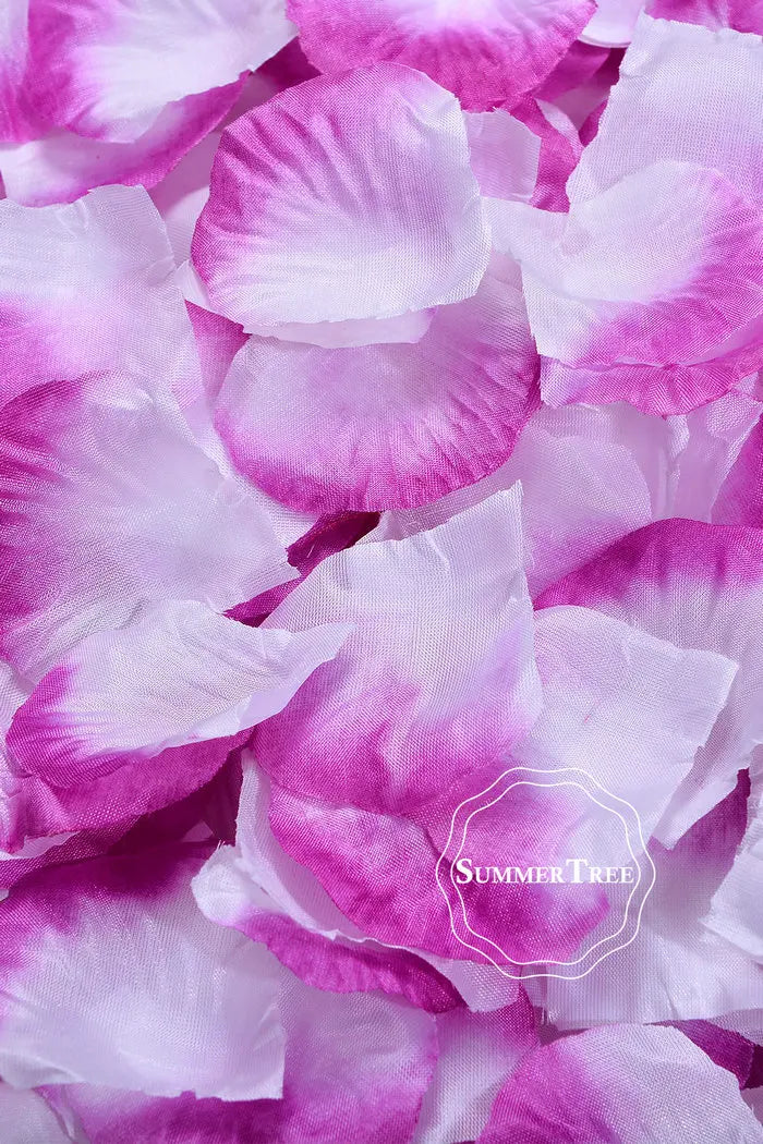 Pink and purple silk rose petals used for weddings and events