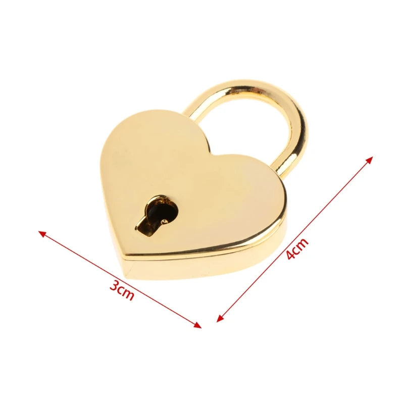 A vintage heart-shaped mini padlock with a key, gold in color.