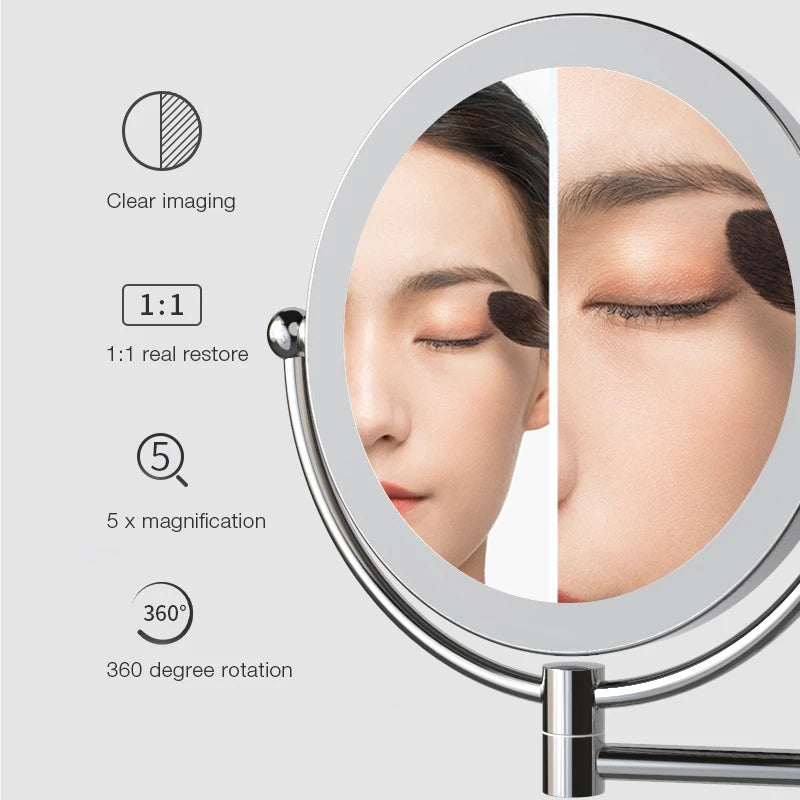 A wall-mounted LED makeup mirror showing features like clear imaging, 1:1 restoration, 5x magnification, and 360-degree rotat