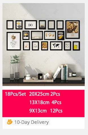 A set of black wooden photo frames with various designs displayed on a white wall.