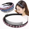 A woman is shown wearing a black crystal rhinestone headband for women.