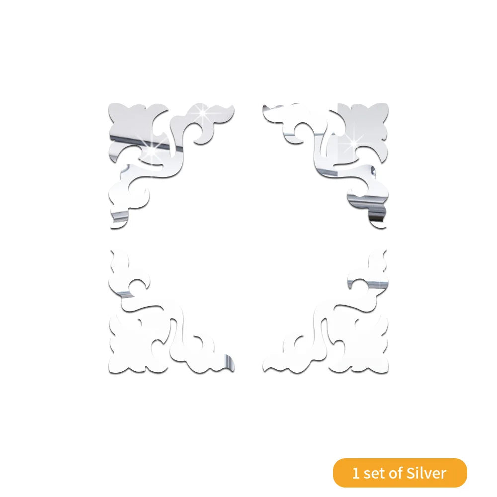 A set of silver 3D acrylic mirror wall stickers or decorative self-adhesive tiles.