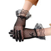 Black sheer lace gloves with ruffled cuffs worn on a hand.