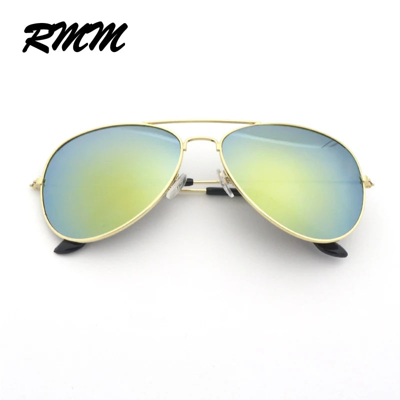 Gold-framed pilot sunglasses with mirrored green lenses shown against a white background.