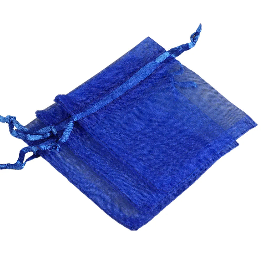 A royal blue organza drawstring gift pouch for jewelry, candy, or party favors.