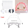 A set of clear plastic column stands and an adjustable balloon arch for decoration