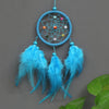 Handmade feather dreamcatcher wall decor with blue feathers and a circular web of beads